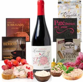 Cesta gourmet con vino tinto tempranillo y patés ibéricos
